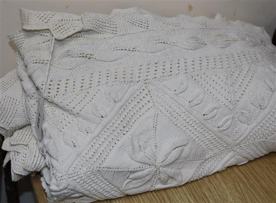 A hand knitted bed cover